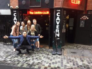 First year journalism students outside the Cavern Club, taking part in the live blog as part of Induction Week