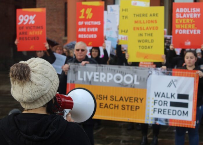 Beatriz Roberts from 'Stop the Traffik Liverpool' rallies the walkers at the start of the day. Pic © Ash Rowe JMU Journalism