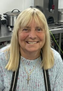 Hillsborough campaigner Margaret Aspinall helps with meals for walking footballers at the Liverpool FC Foundation