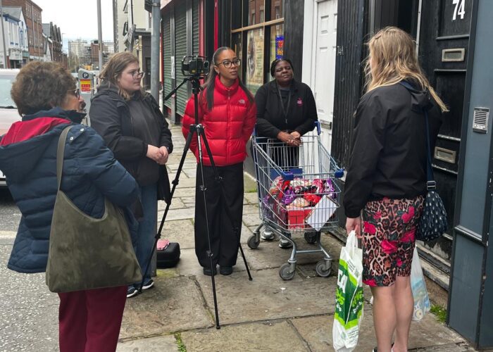 Students reporting live on location as part of a newsday