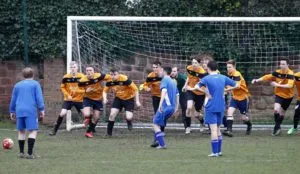 The first years charge down an indirect free-kick in the box. Pic © Craig Galloway