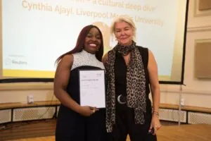 Cynthia Ajayi receives the NCTJ's 'Student Project of the Year' award from Sky News special correspondent, Alex Crawford. Picture by Jon Parker Lee