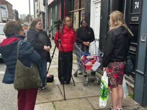 Students reporting live on location as part of a newsday